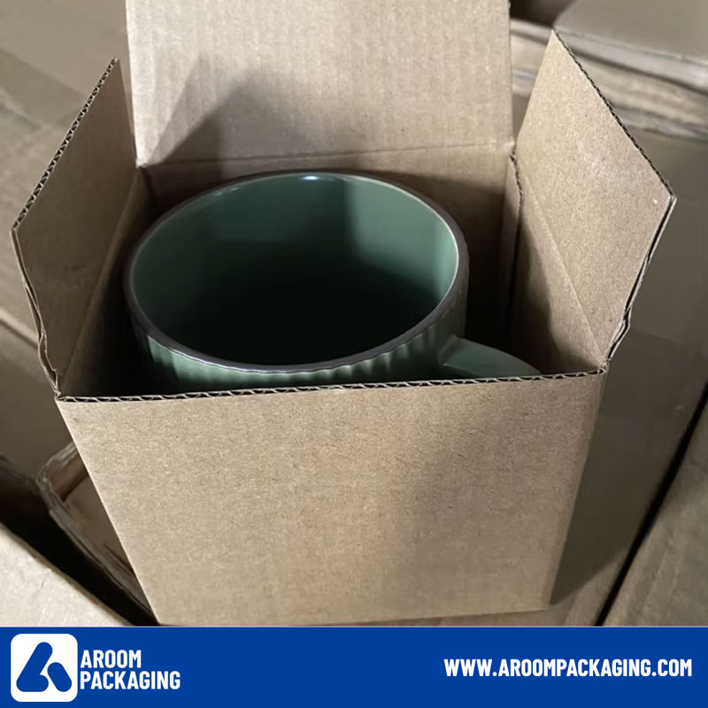 Brown Cardboard Box of Green Ceramic Mug